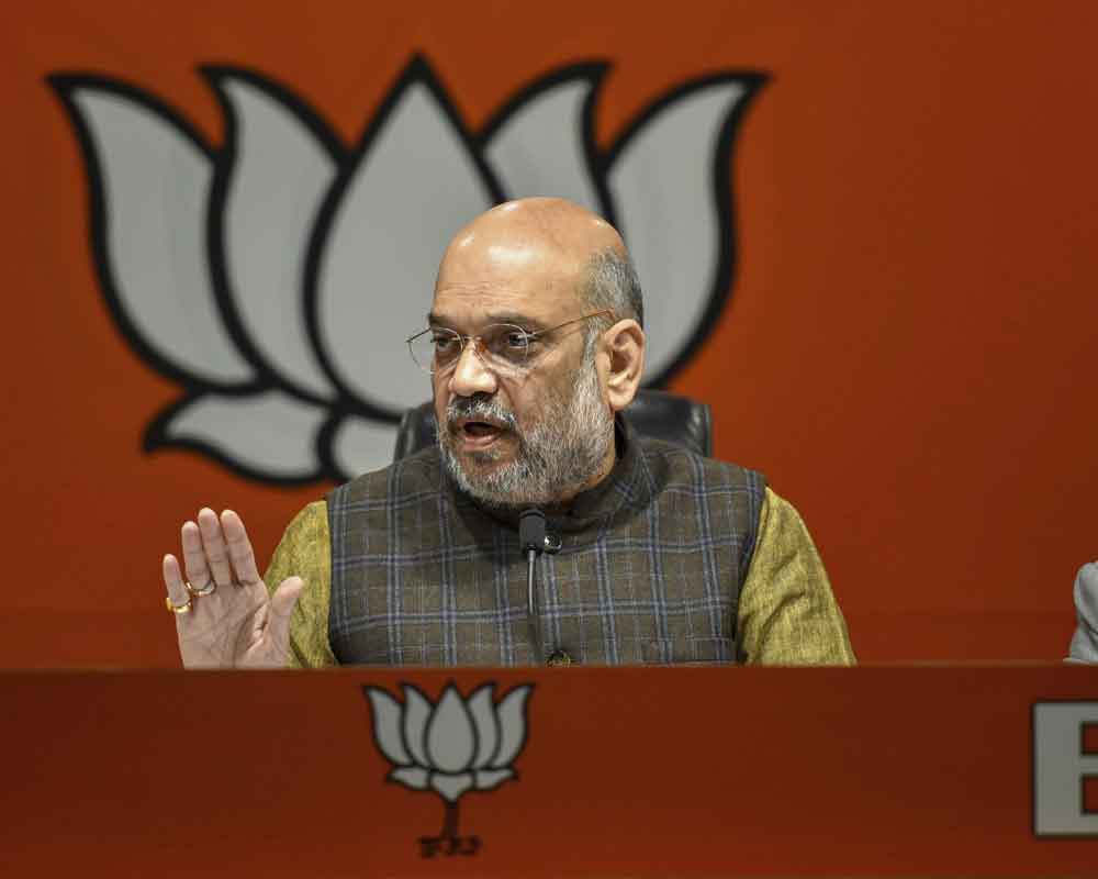 52 Dalits, tribals 'ensalved' in K'taka, govt busy with cabinet expansion: Shah