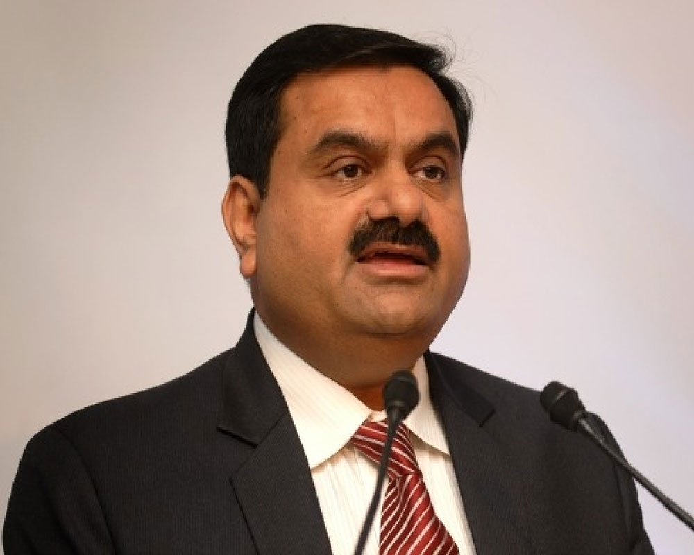 Adani, Total join hands to set up retail network, LNG terminal