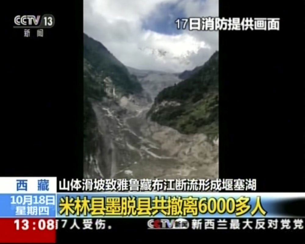 China orders evacuations after landslide blocks Tibet river