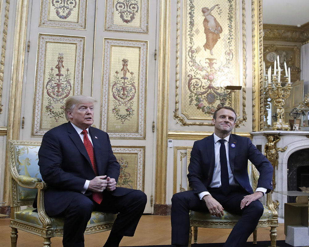 Macron hosts Trump amid row over European defence