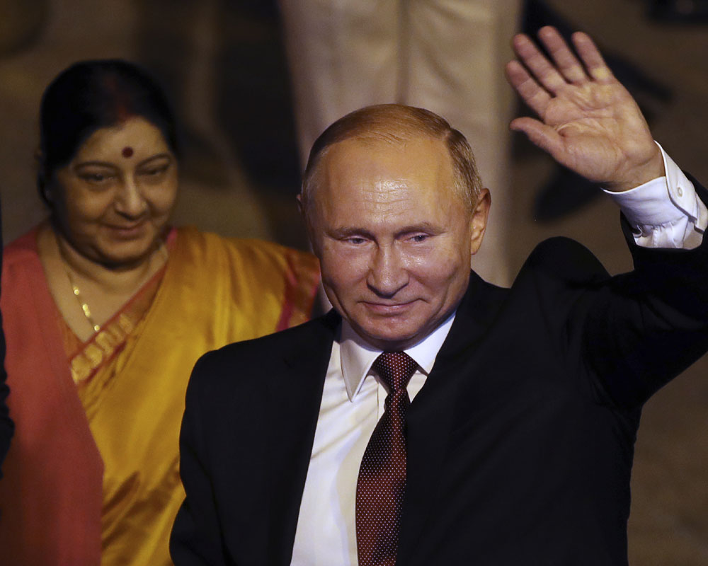 Putin arrives in India for summit with Modi