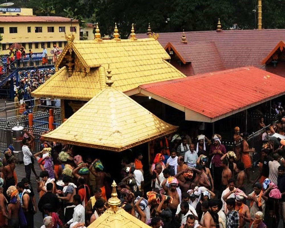 Tension mounts as devotees stop women from travelling to Sabarimala