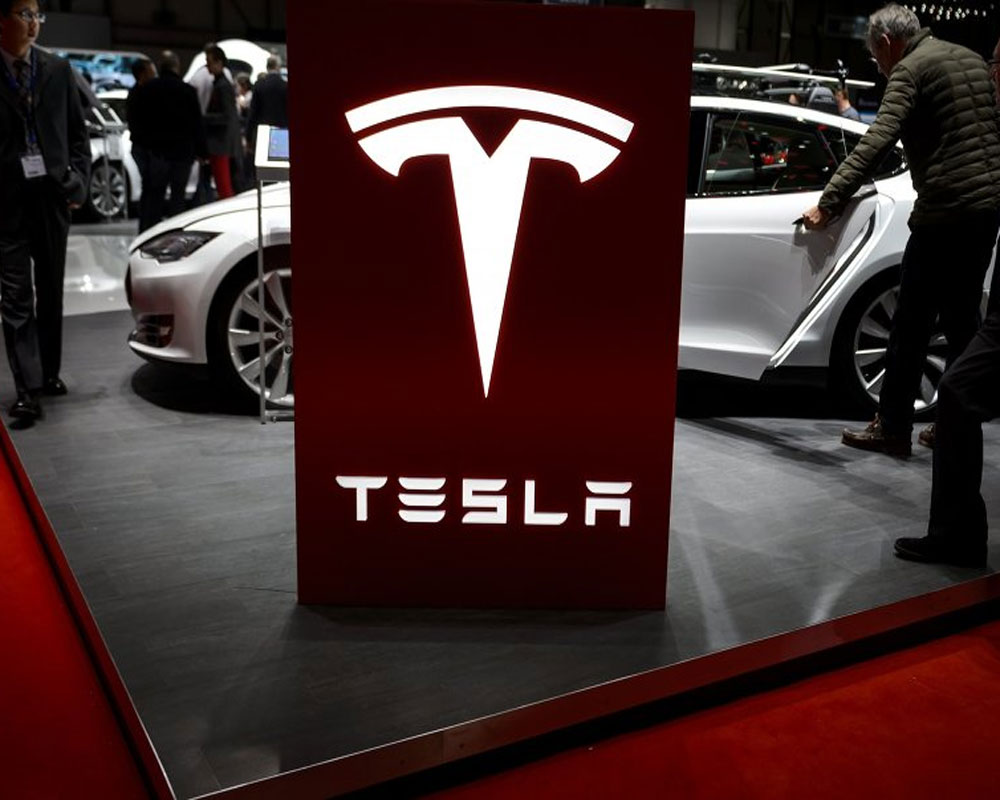 Tesla launches new 'Model 3' with mid-range battery