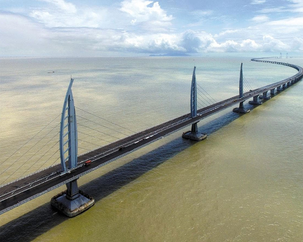 World's longest sea-crossing bridge opens between Hong Kong, China
