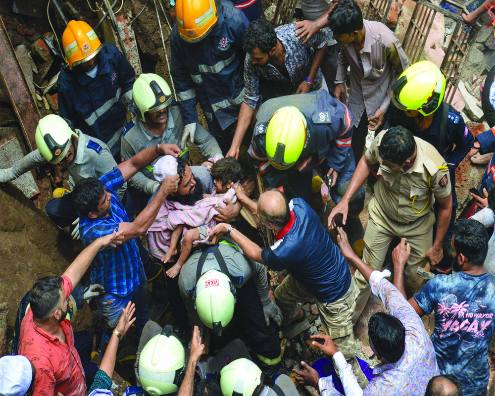 11 dead, 40 trapped in Mumbai building cave-in