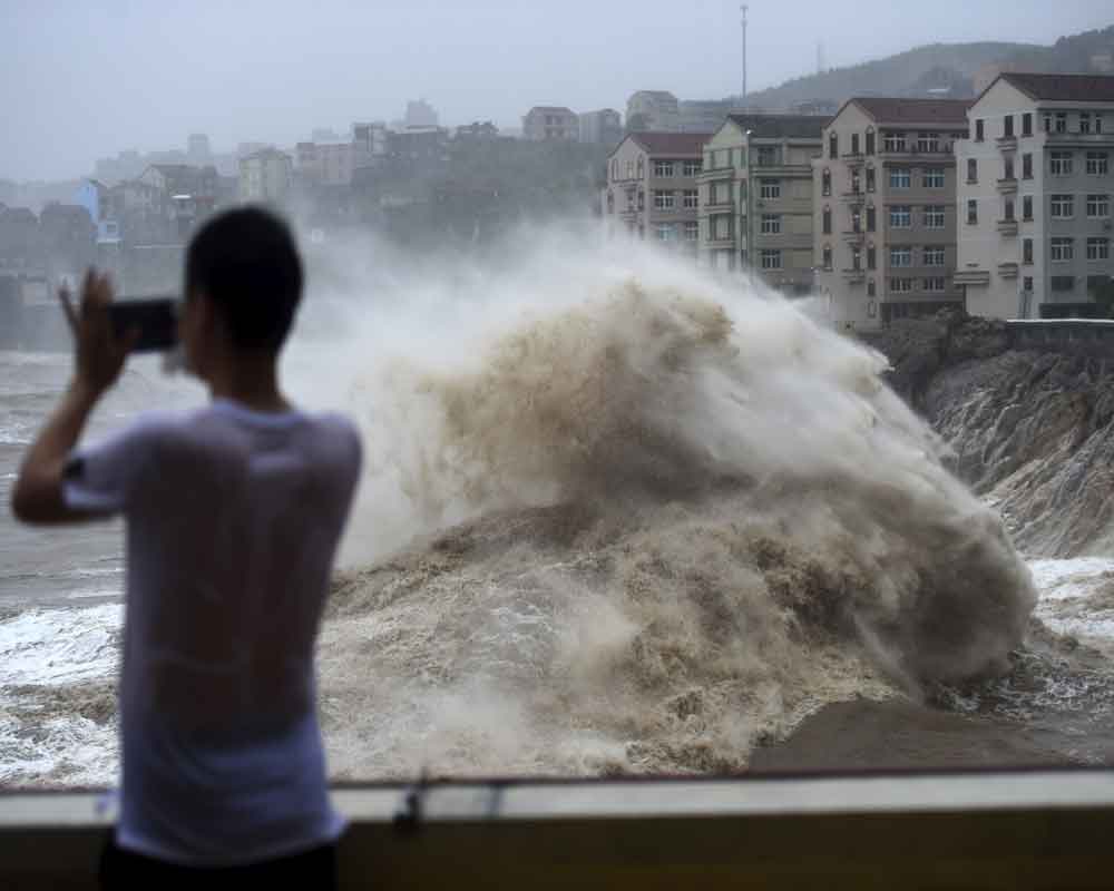 18 killed 14 missing as Typhoon Lekima hits China's coast