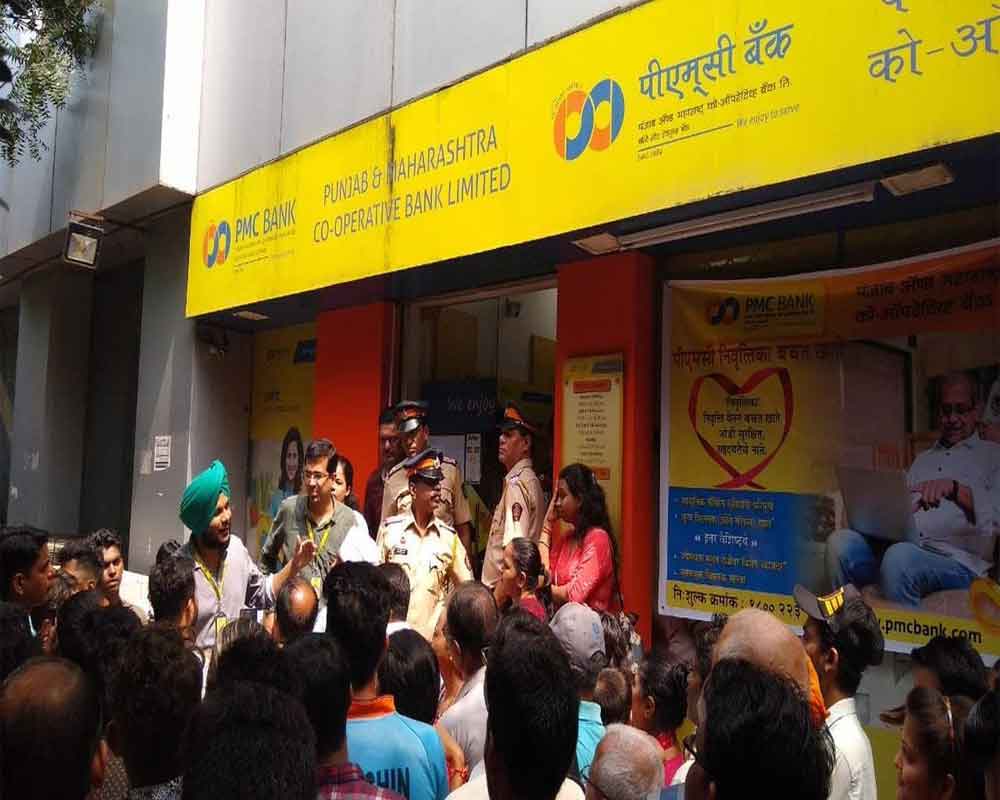 Around 50 PMC bank customers stage protest outside RBI