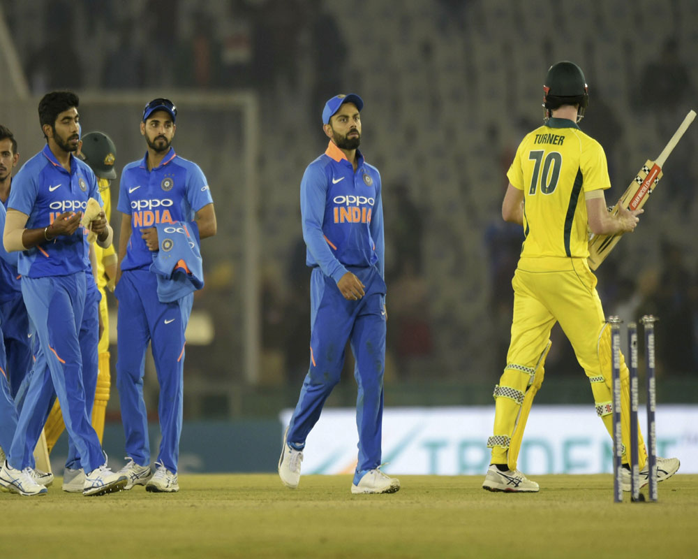 Australia beat India by four wickets in fourth ODI