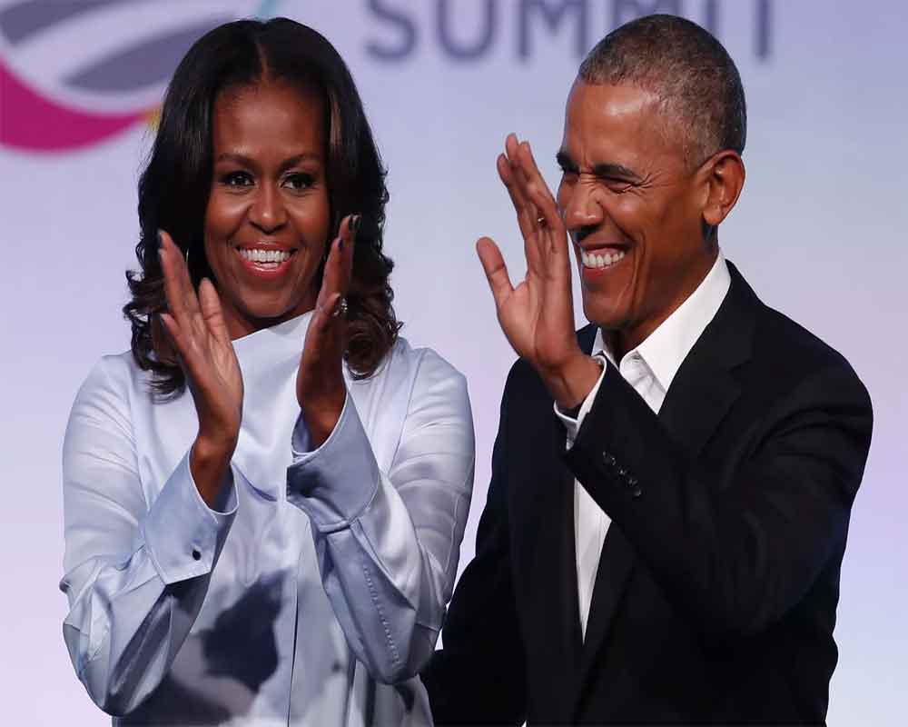 Barack and Michelle Obama sign deal to produce podcasts for Spotify
