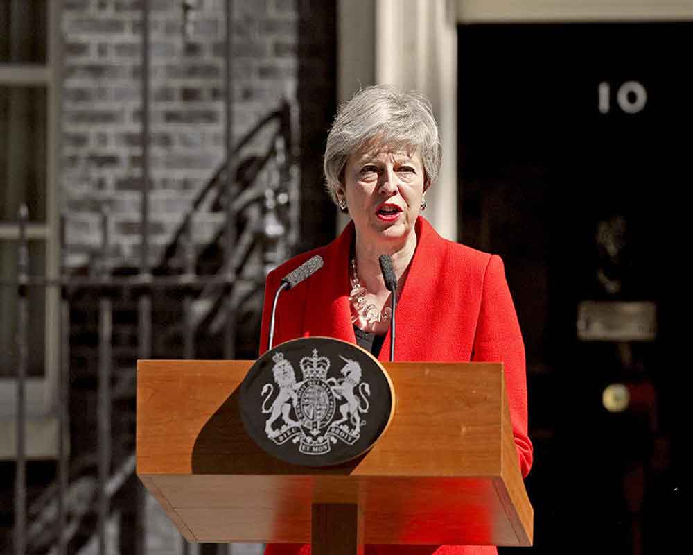British PM May calls Modi on poll win, discusses G20, ICC World Cup