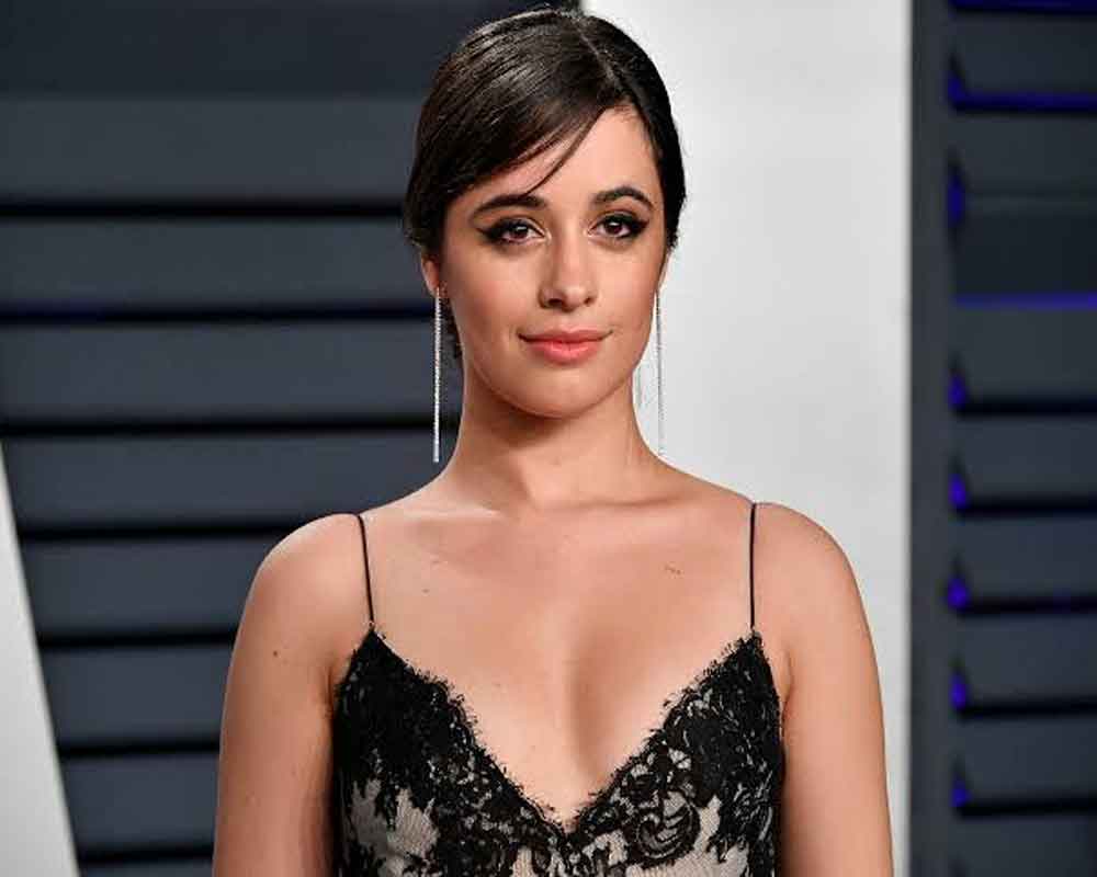 Camila gets 'Shakespeare in love' quote as first ink