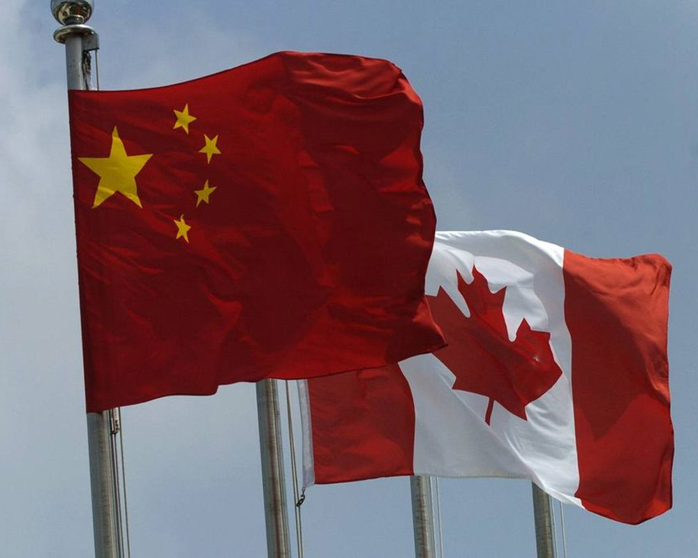 Canada reviews China travel advisory after national's death sentence