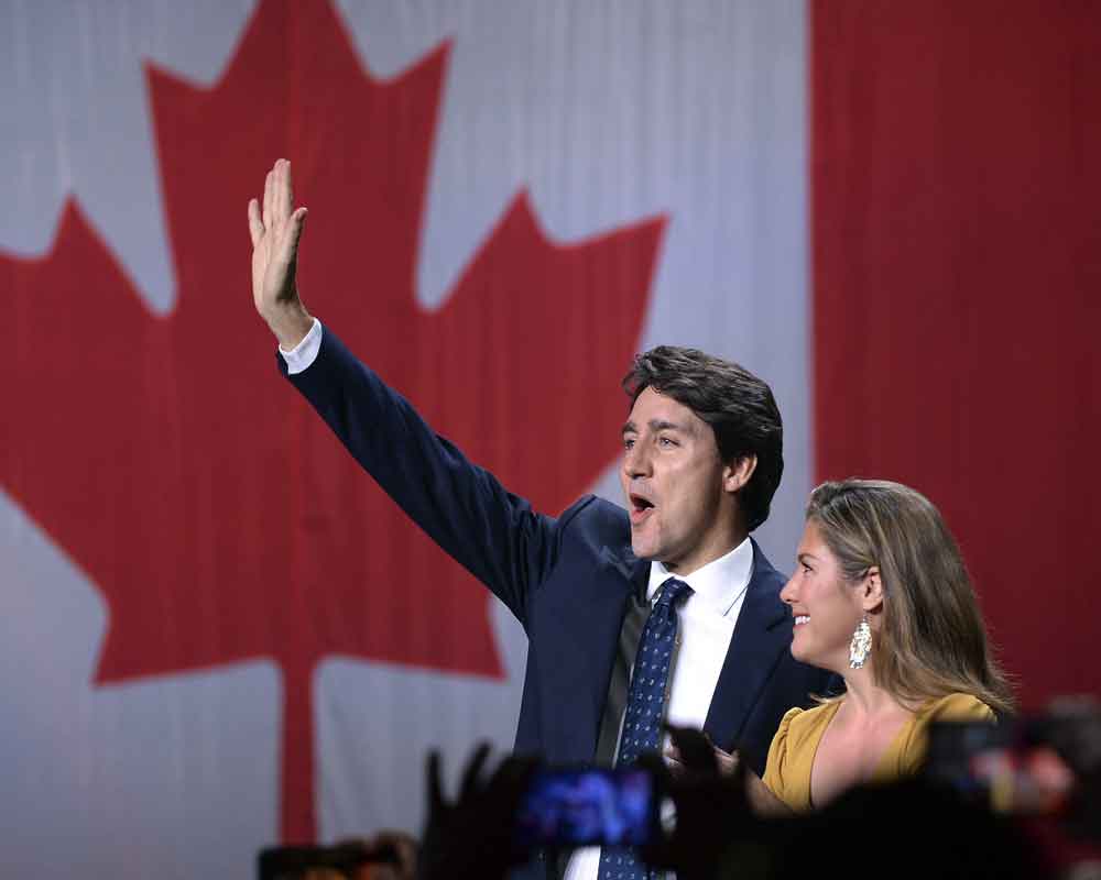 Canada's Trudeau wins 2nd term but loses majority