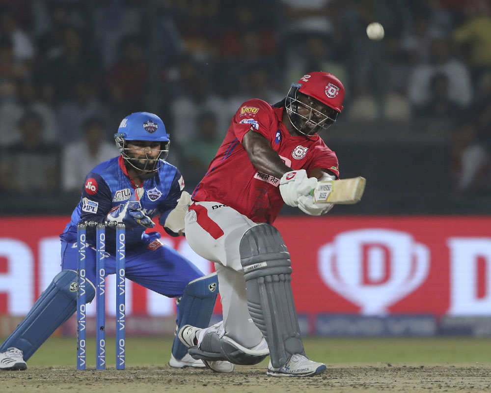 DC rally to stop KXIP at 163/7 after Gayle blitzkrieg