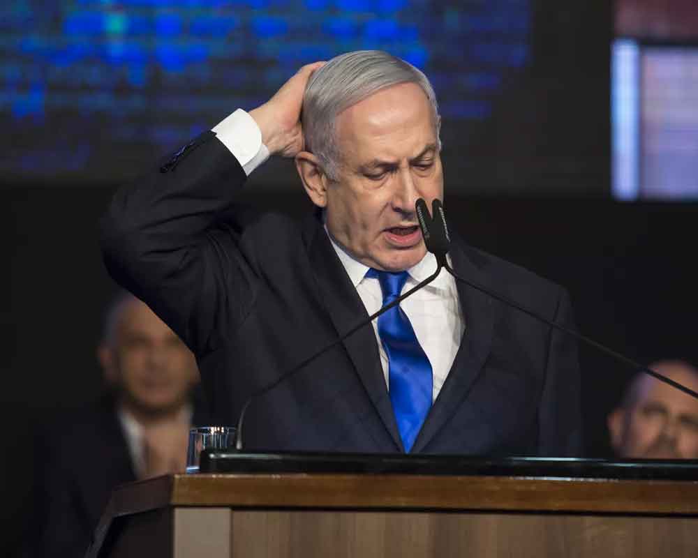 Defiant Netanyahu rejects graft indictment, vows to stay