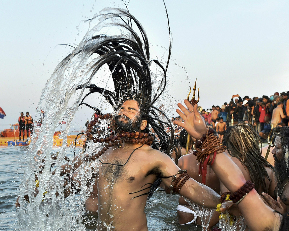 Devotees Take Holy Dip On Makar Sankranti As Kumbh Mela Opens 
