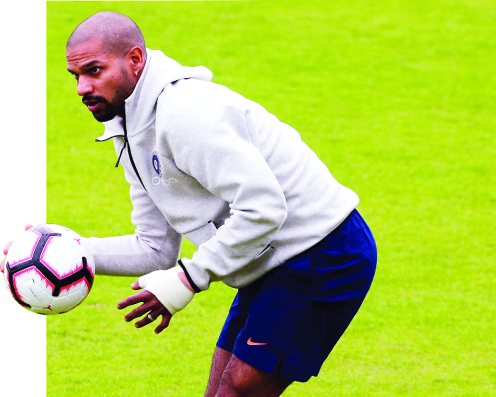 Dhawan out of World Cup