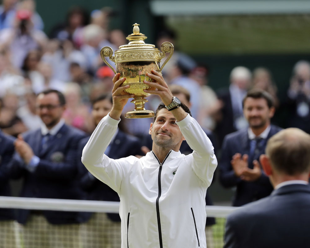 Djokovic edges Federer in 5 sets for 5th Wimbledon trophy