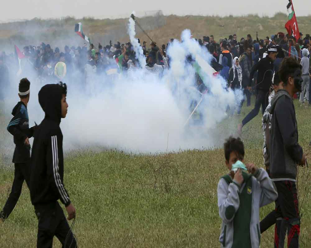 Four killed as thousands protest at border, but Gaza-Israel truce holds