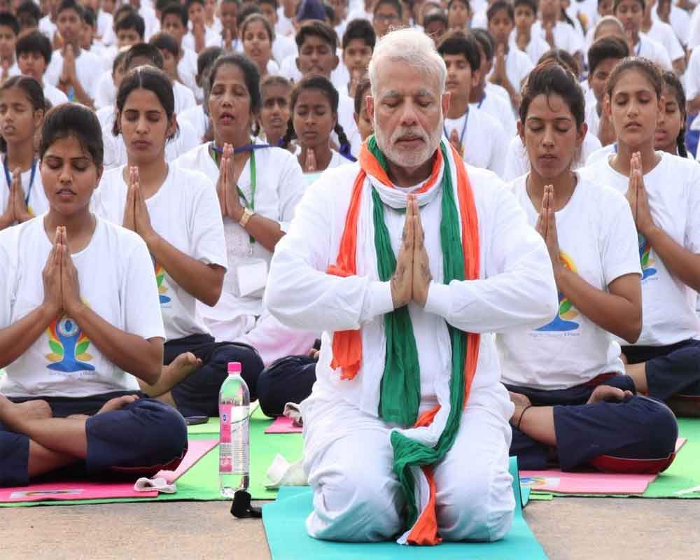 Gearing up for Yoga Day, Modi posts 'Vakrasana' video