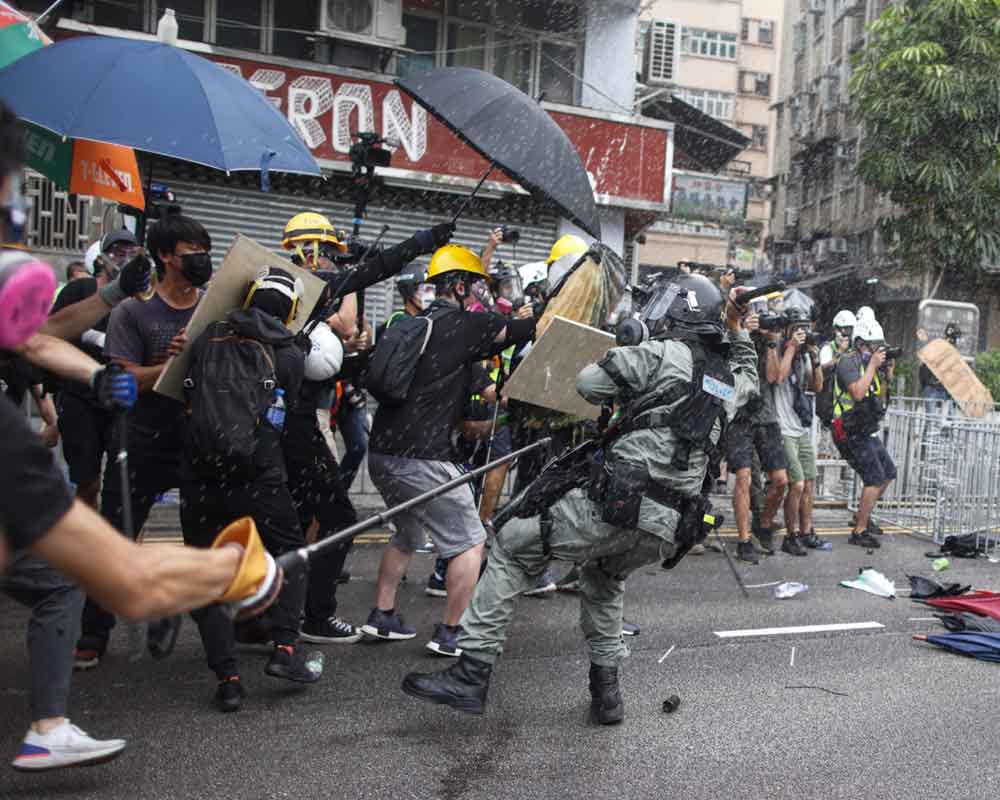 Hong Kong braces for new rally after fresh riot police clashes