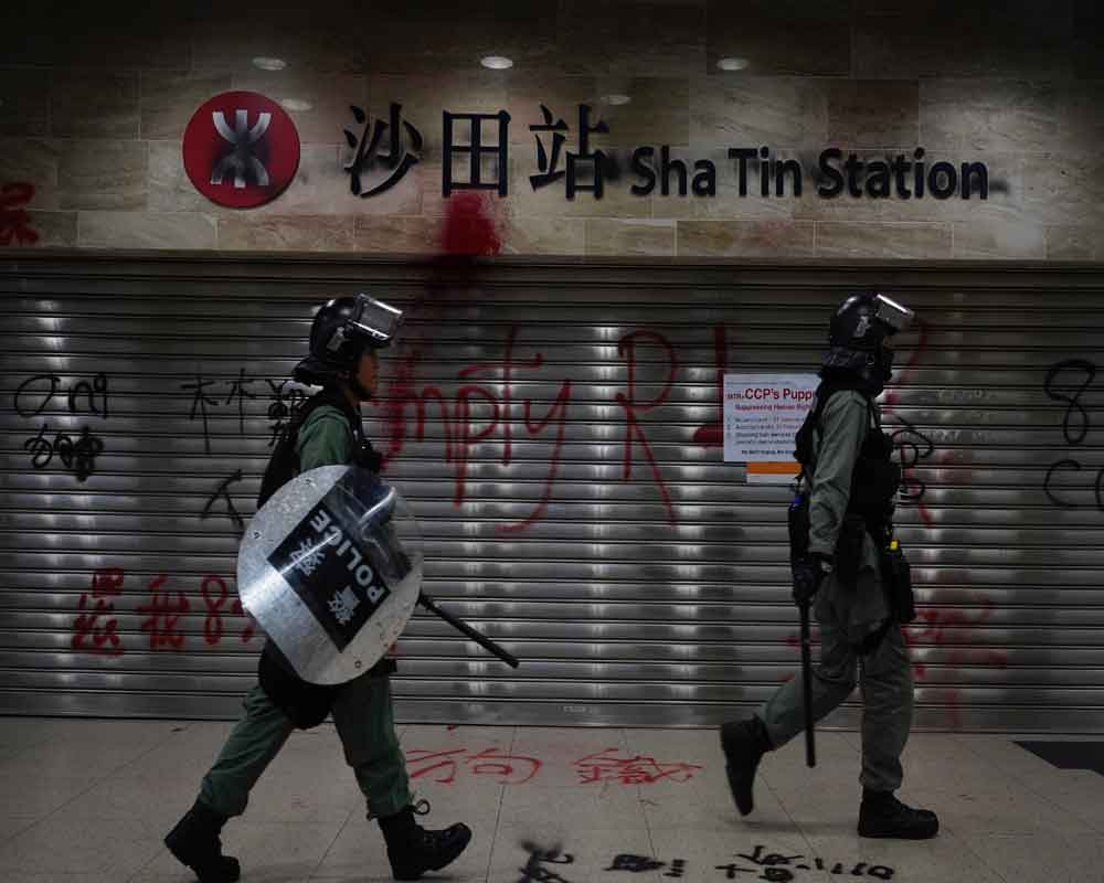 Hong Kong police say they were attacked by explosive device