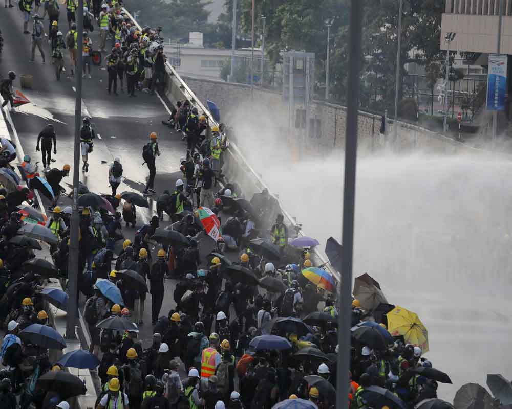 Hong Kong returns to violence with tear gas and Molotovs