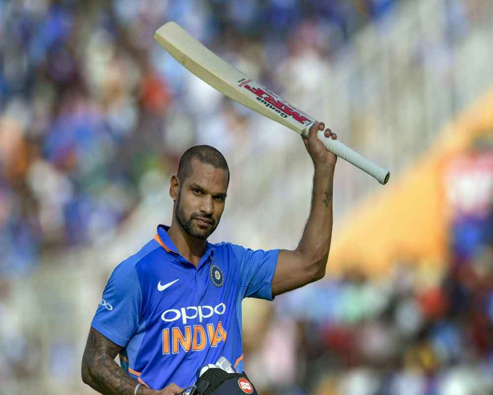 I don't react to criticism as I live in my own world: Dhawan