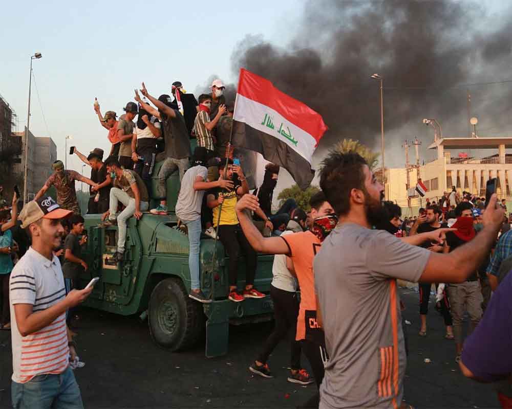 Iraq protest death toll nears 100: rights panel