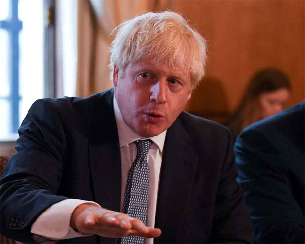 Johnson tells EU he wants Brexit deal but without backstop