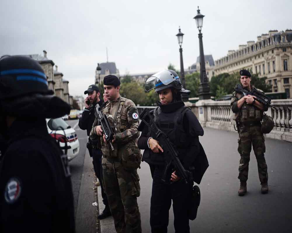 Four police killed in Paris stabbing, attacker shot dead