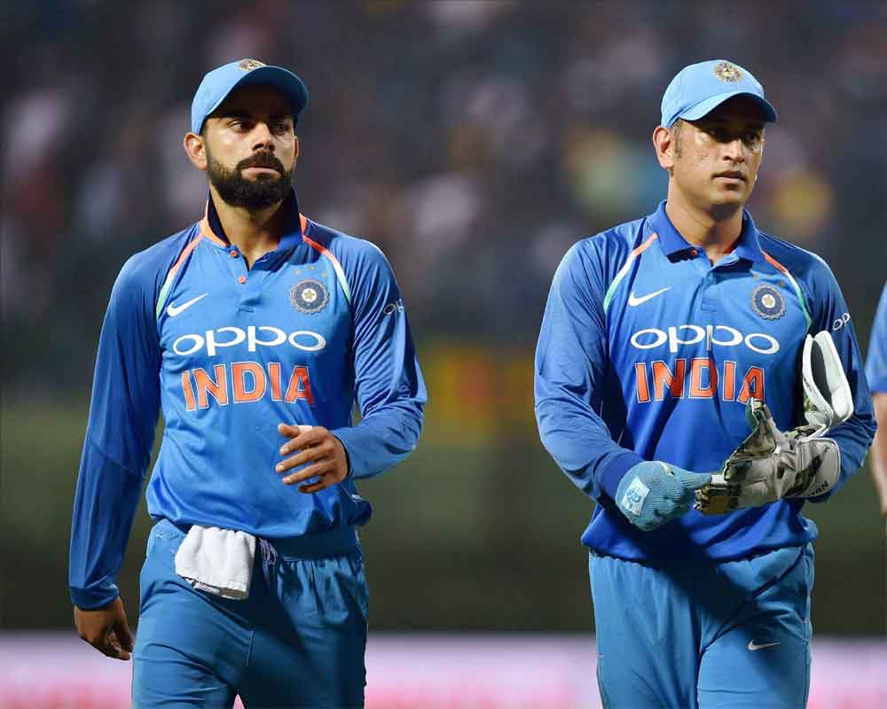 Kohli, Dhoni lead India to series-levelling win in Adelaide
