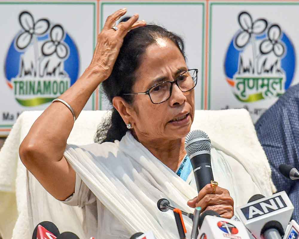 Mamata reshuffles state cabinet after poll drubbing