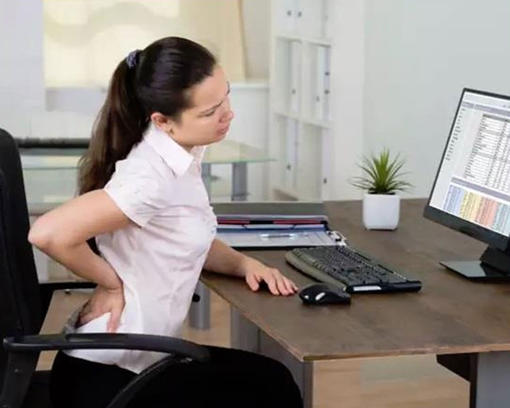 Poor posture at work may cause fatigue, spinal injury