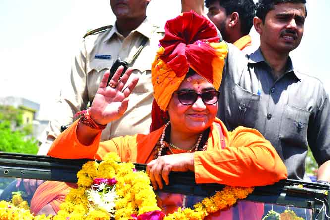 Pragya says sorry on Godse  after Opp flak, BJP reproof