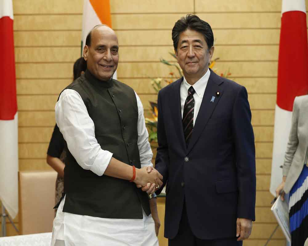 Rajnath Singh apprises Japan PM Abe about India's decision on J-K