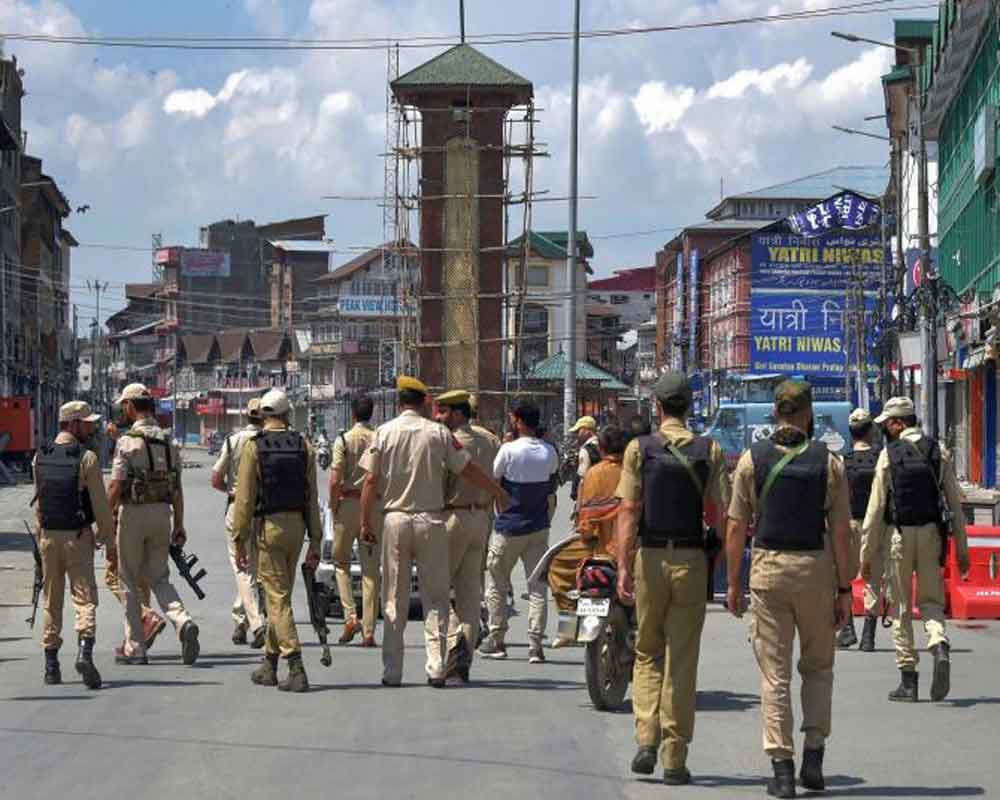 Restrictions eased in most Kashmir areas,  market still shut and mobile services suspended