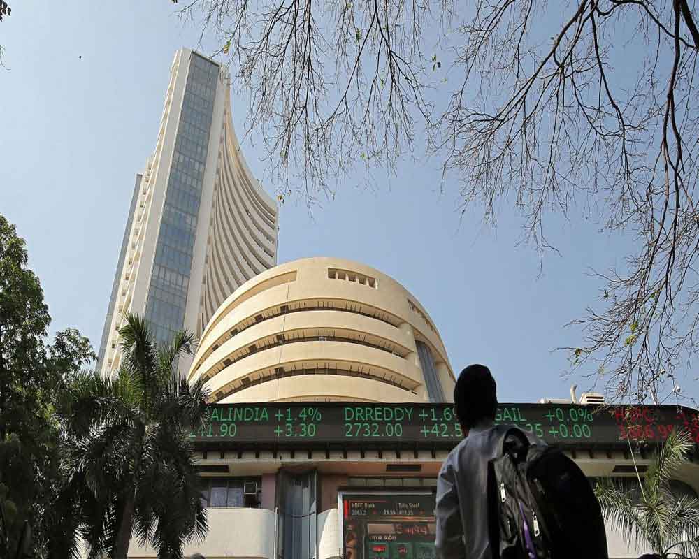 Sensex falls over 100 pts after IMF cuts India's growth outlook
