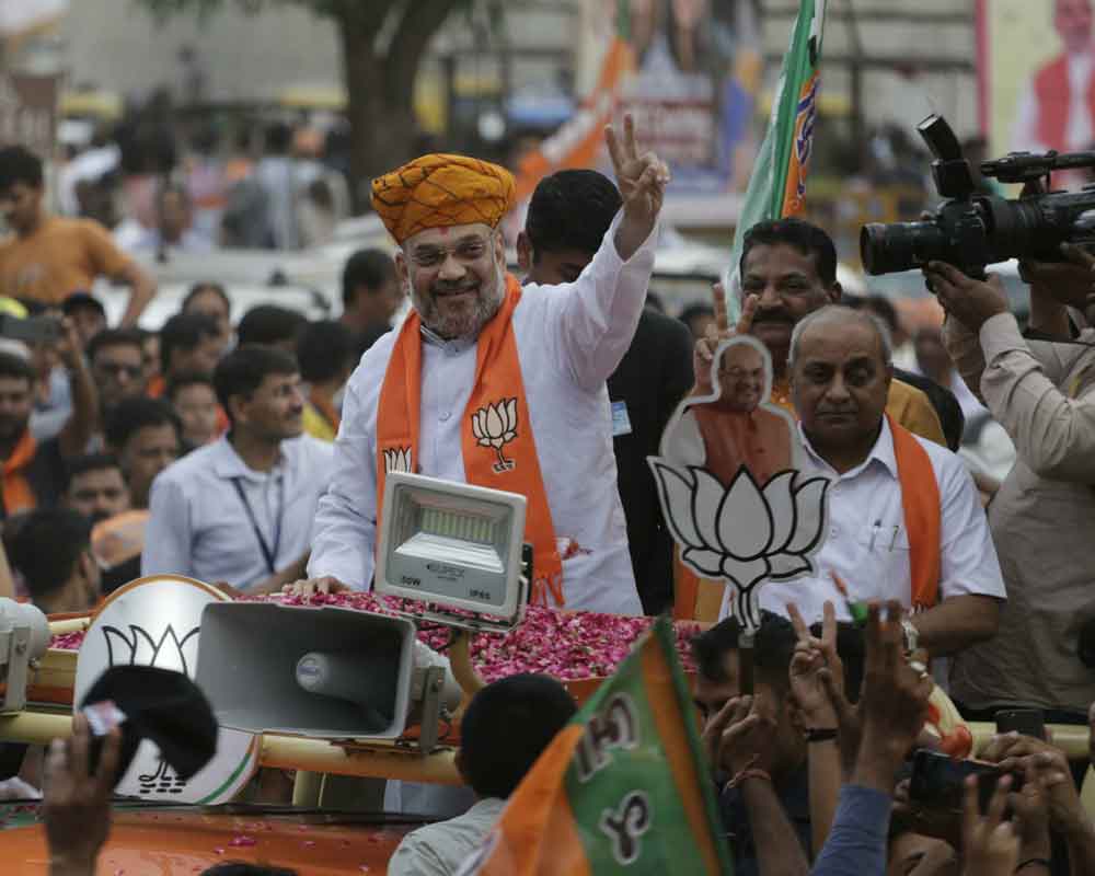 Shah casts vote in Guj, says every vote can take nation ahead