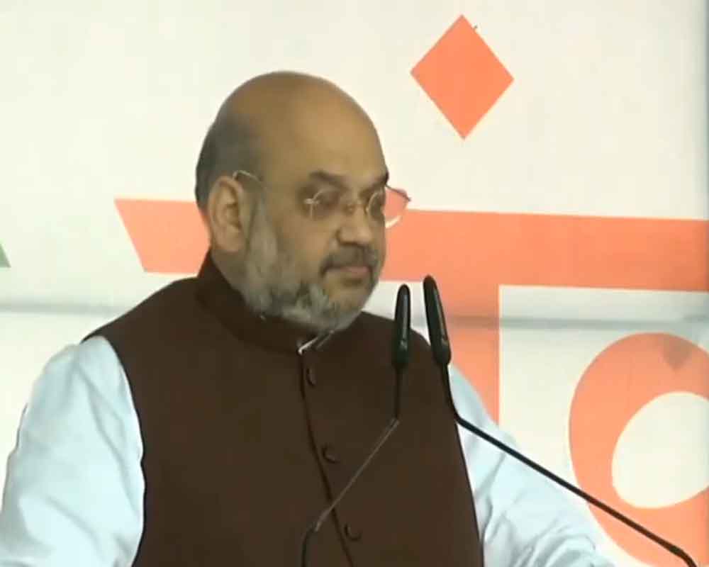 Shah dares Rahul to declare Cong will restore Art 370 in J&K
