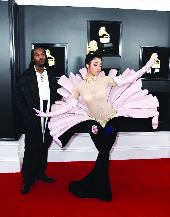 Sparkles, sequins  and statement hats across the carpet