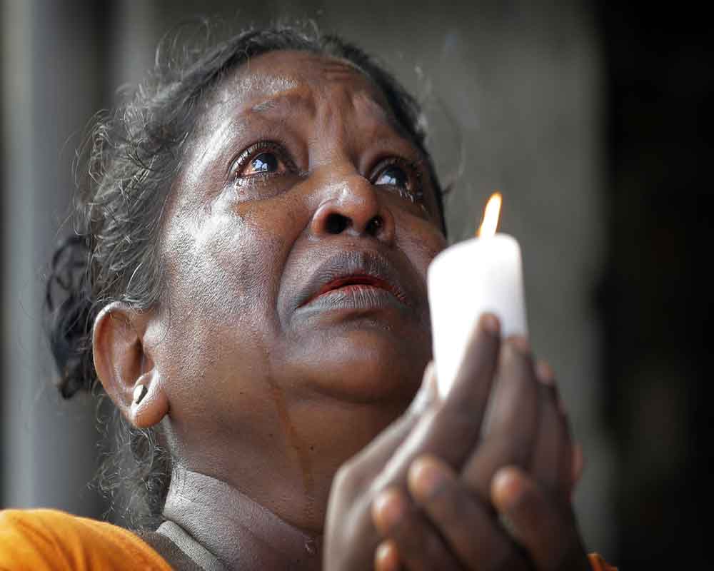 Sri Lanka observes 3-minute silence as death toll rises to 310 in  Easter Sunday attacks