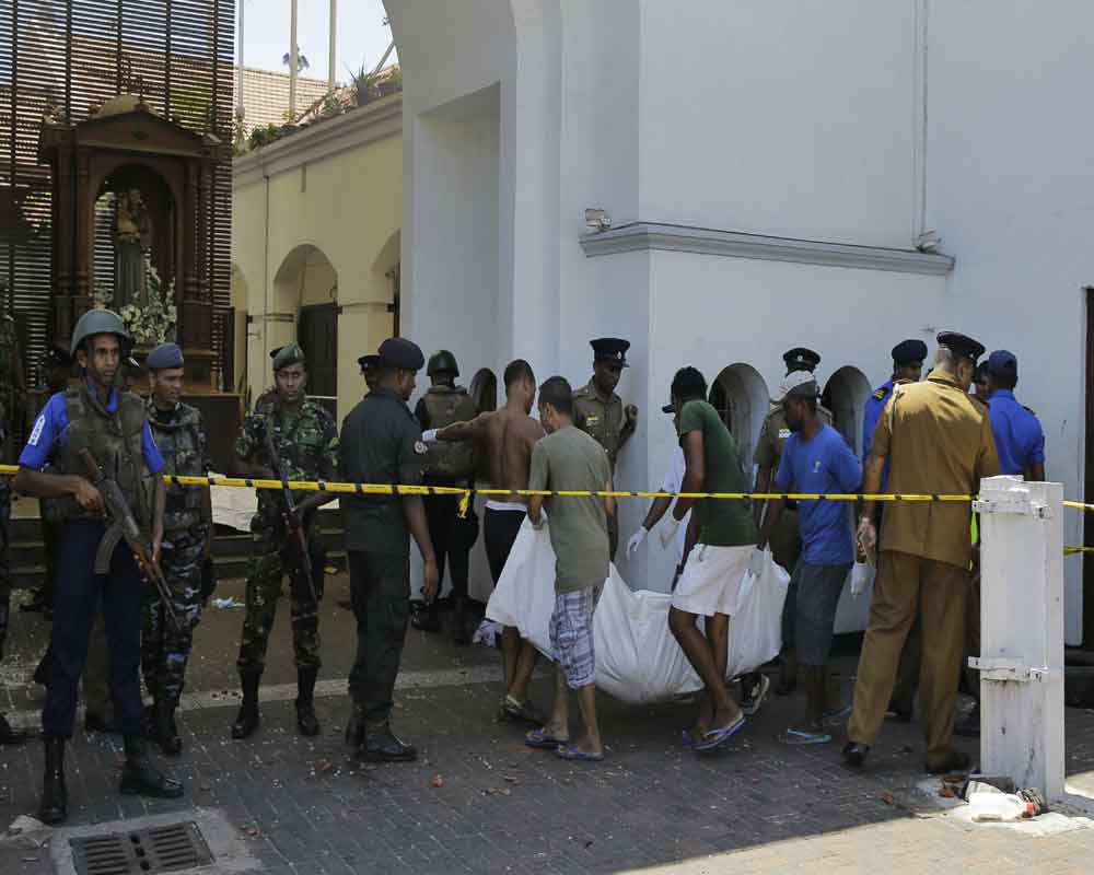 Sri Lanka orders curfew after blasts