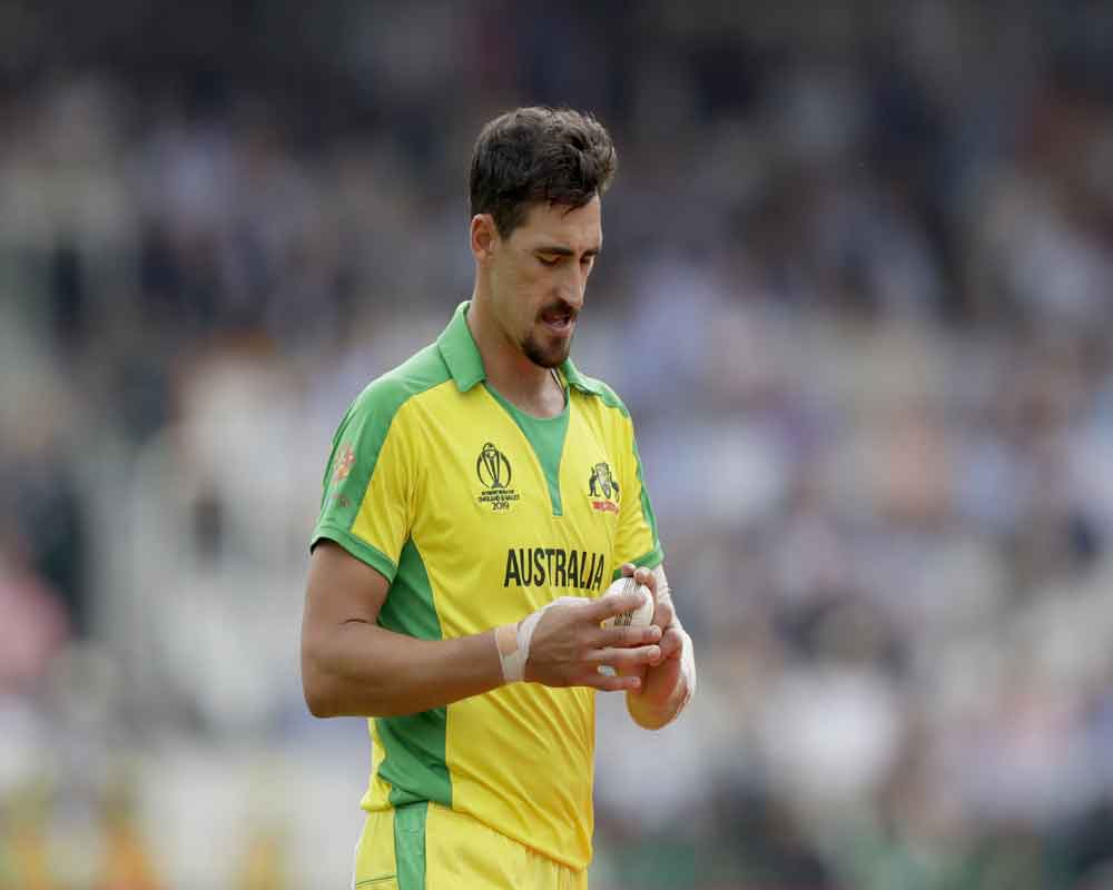 Starc says can't afford to breathe easy after Australia secure semifinal berth