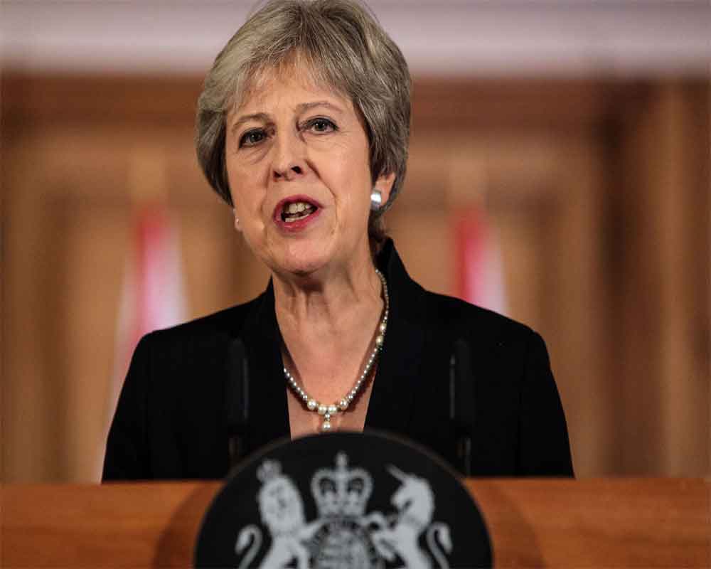 Theresa May condemns 'appalling' church attacks in Sri Lanka on Easter