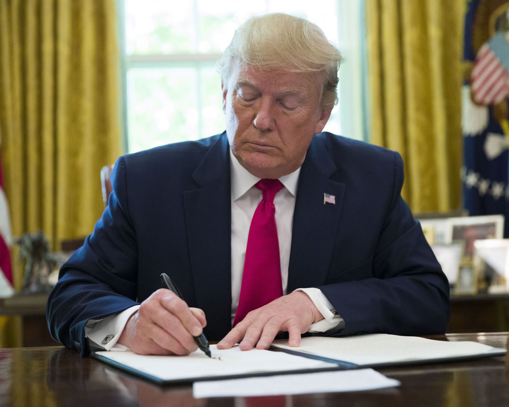 Trump signs executive order imposing 'hard hitting' sanction on Iran