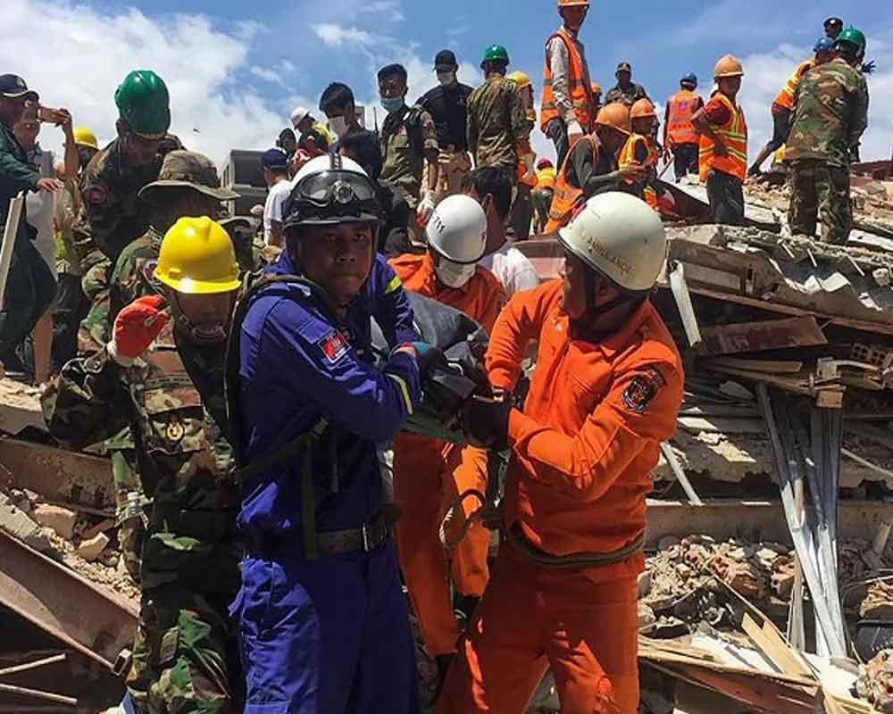 Two survivors pulled from collapsed Cambodia building