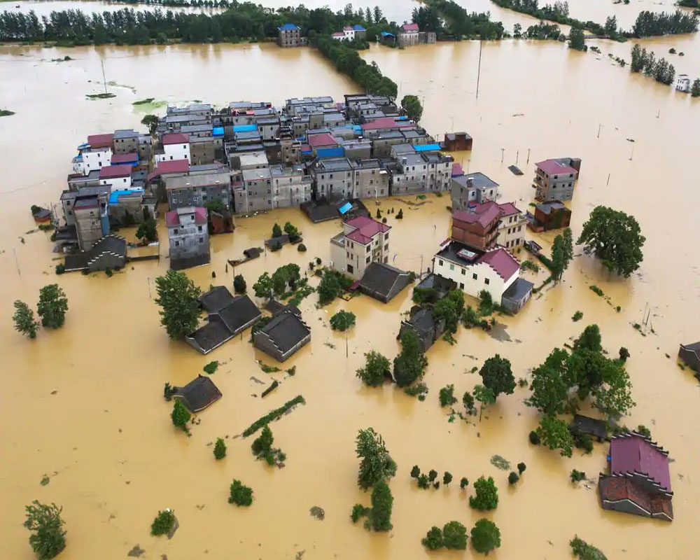 141 dead or missing in floods in China