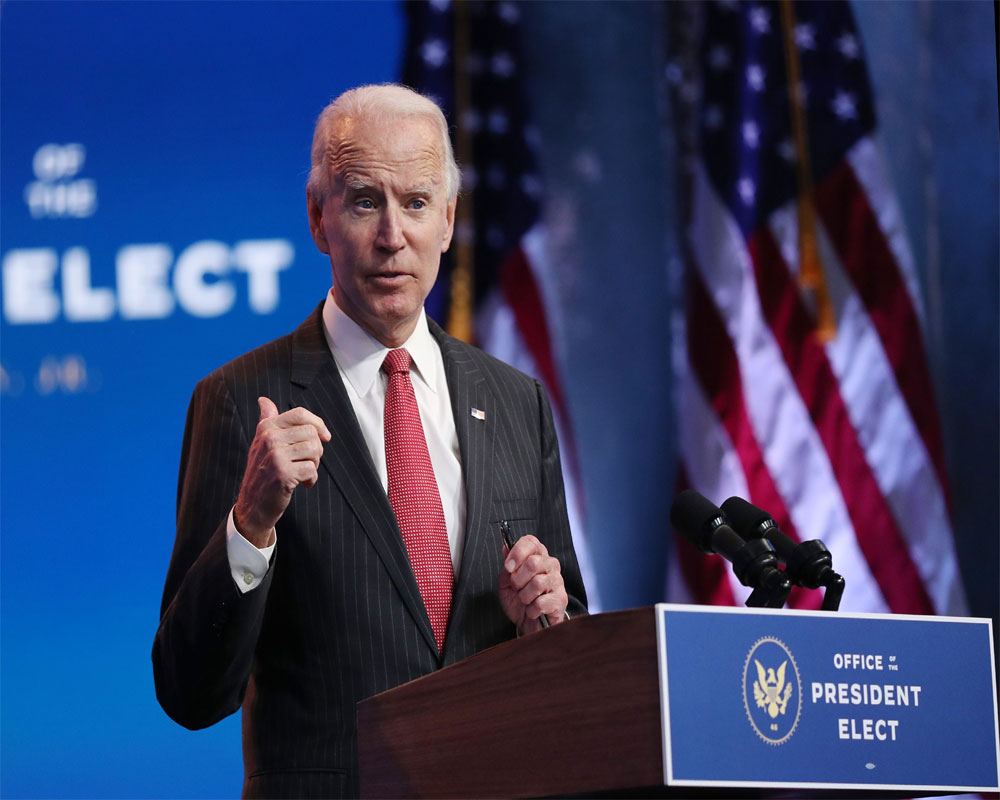Biden declares his administration 'ready to lead the world'