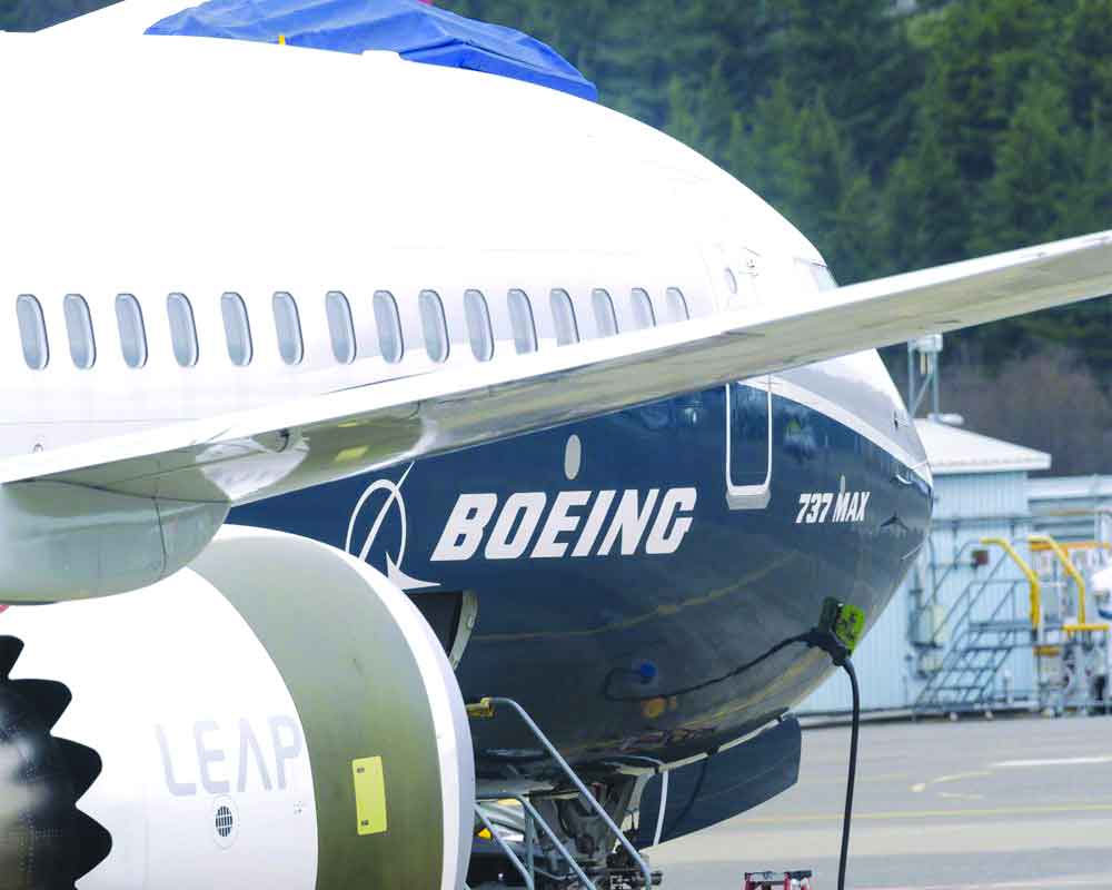 Boeing makes deeper job cuts as aircraft business slows
